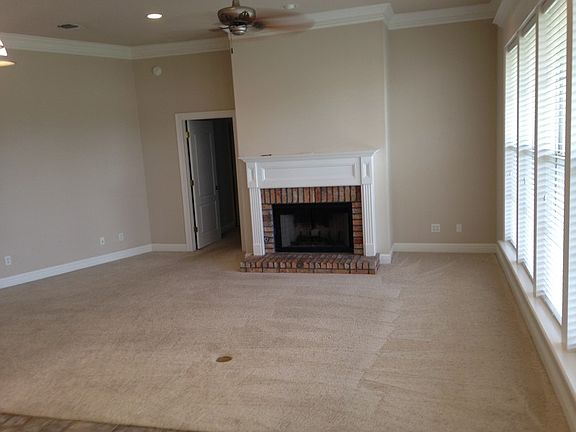 Foyer - View 1
						:
						The lighted foyer can be accessed by the main door or by the garage.