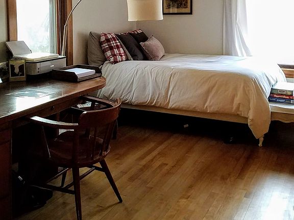 Den or office or 3rd bedroom. Also has a door that accesses the front entrance