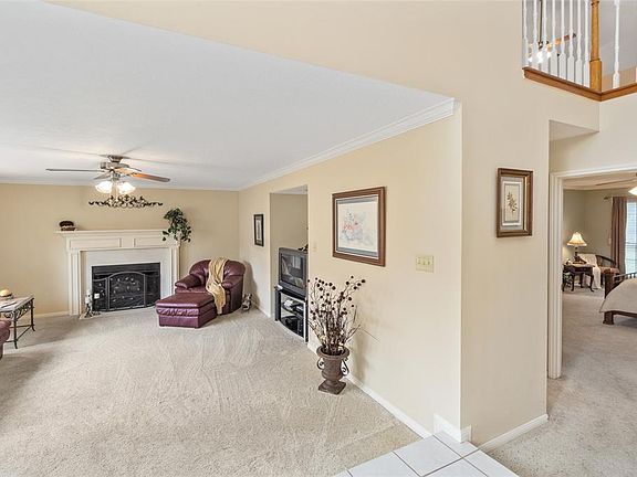 Family room from the foyer and master bedroom behind.