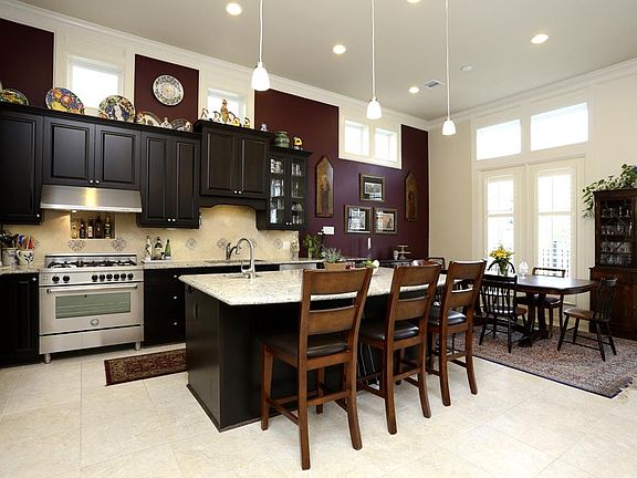 KITCHEN (13'x14') The open design of the kitchen/dining/living area is perfect for entertaining. Dir