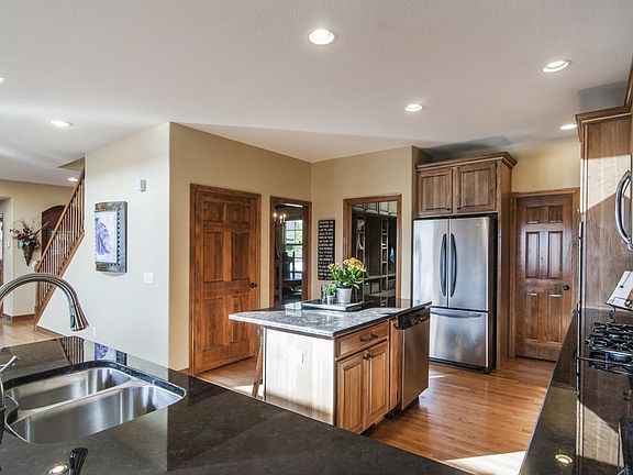 Kitchen with slab granite countertops