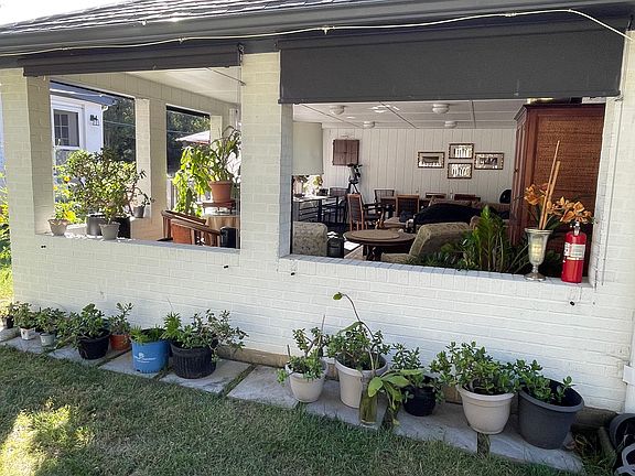Outdoor covered patio. 3-4 season. Privacy blinds. Can be heated w propane gas.