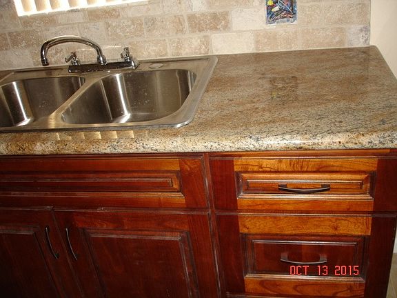 New kitchen cabinets with granite counter tops