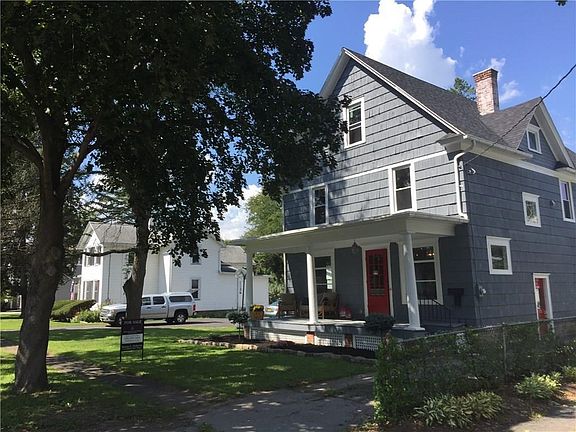 This grand home is situated on a tree lined street; and has been carefully rehabbed.  It offers many (mechanical) improvements.
