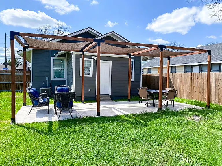 Enjoy outdoor living in the spacious, fully fenced backyard featuring a large patio with plenty of room for dining, entertaining, or simply relaxing outdoors.