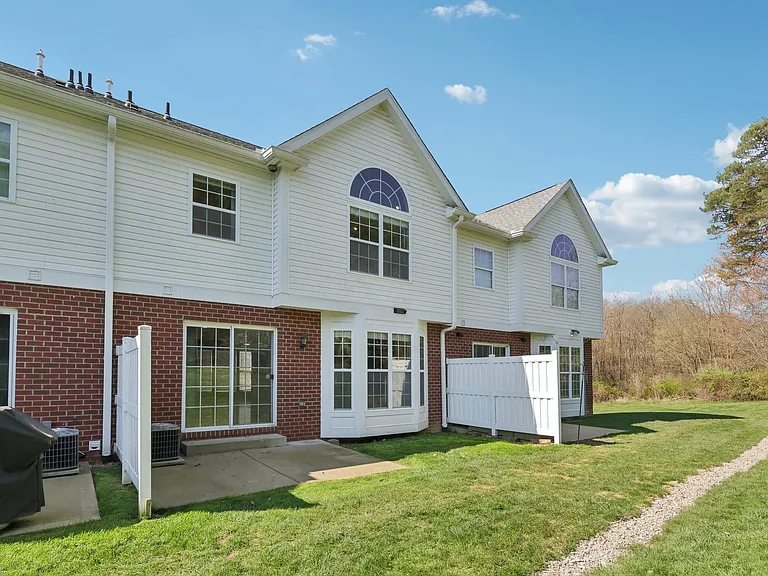 Lakeview 502 - Rear View with Patio and Bay Windows
