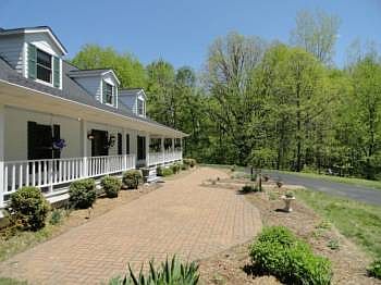 This Bill Phillips custom built home on a full cement block basement with a large egress window was 