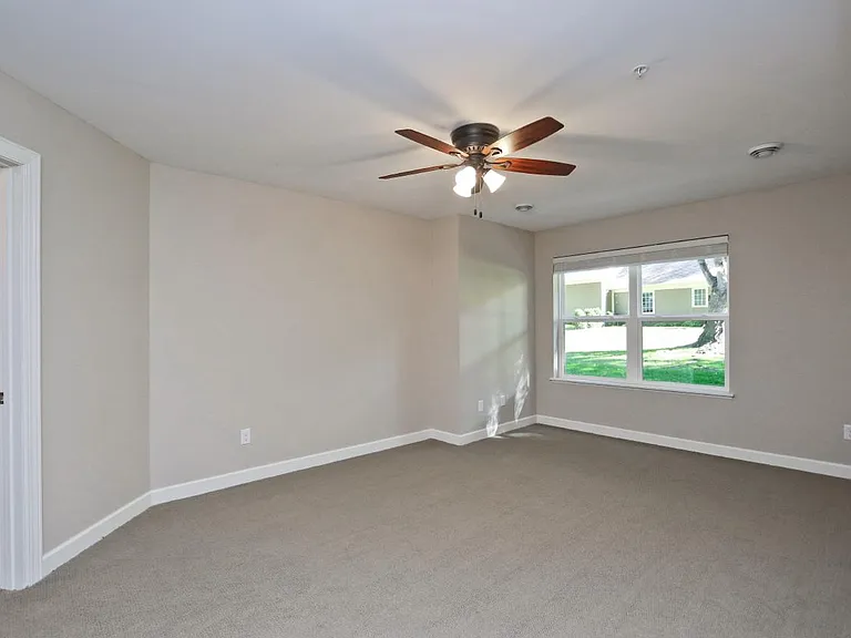 Master bedroom with ceiling fan