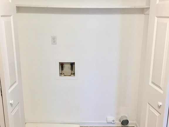 Laundry room in kitchen area