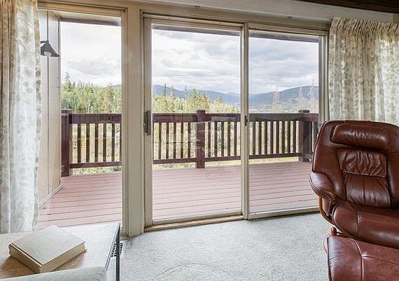 Living room w/ view of deck