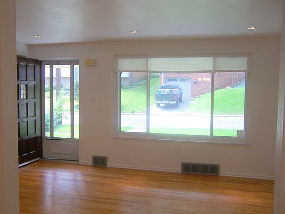 Gorgeous, bright living room, large new window