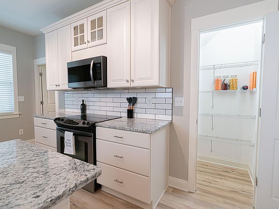 Granite countertops and walk-in pantry