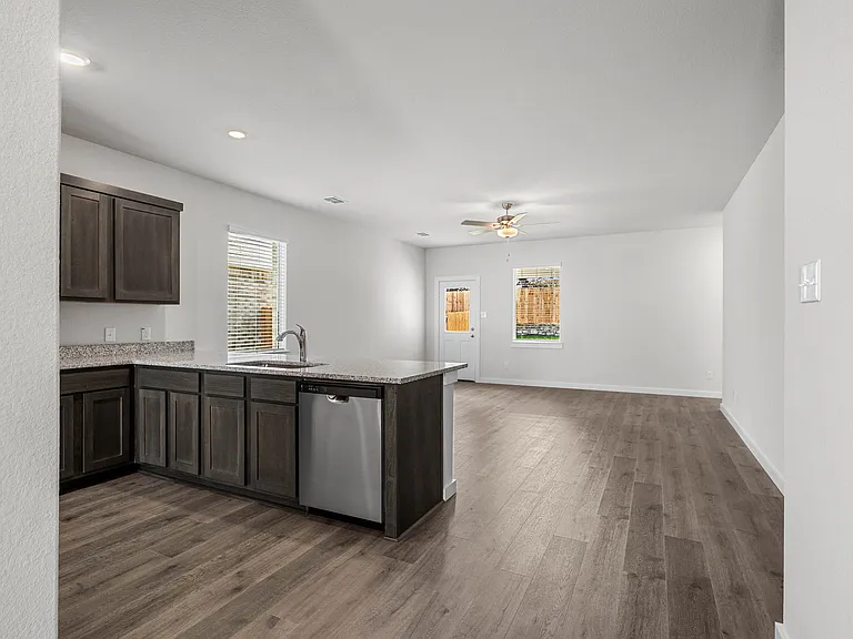 The living room sits right off of the kitchen.