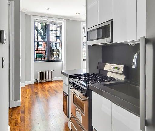 5th image of 329 E 58th St APT A
