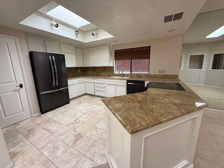 Large kitchen with loads of storage and counter space