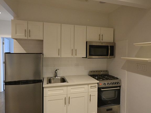 5th image of 523 E 12th St APT 14