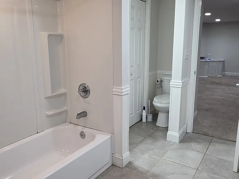 Full bath and laundry in Basement
