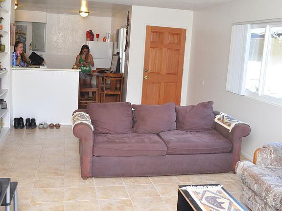 Living room looking toward kitchen. Down Stair unit in picture same as upstairs.