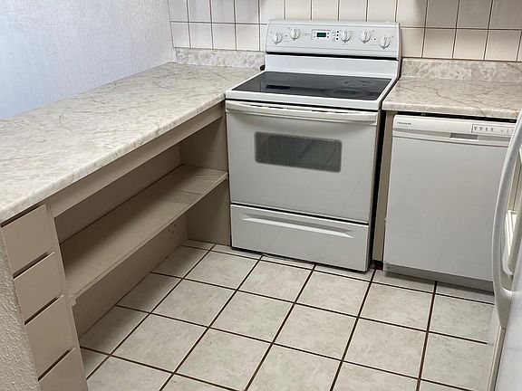 5th image of 4703 Country Club Ln NW APT H4