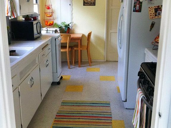 Kitchen table included.  Fridge pictured is not the one included.