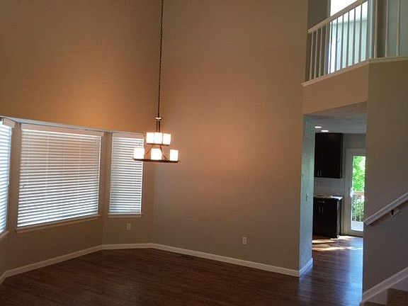 Dining room/living room, hardwoods, new blinds, NEW energy e