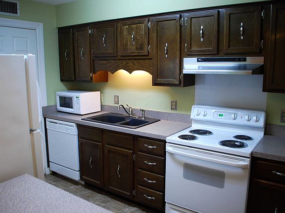 New Countertops, GE Appliances, and New Flooring