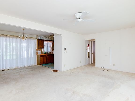 Formal Living Open to the Dining Room / Kitchen