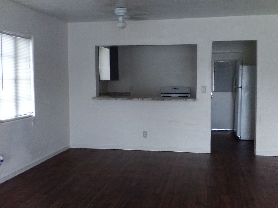 Living room has new vinyl and pass thru to kitchen
