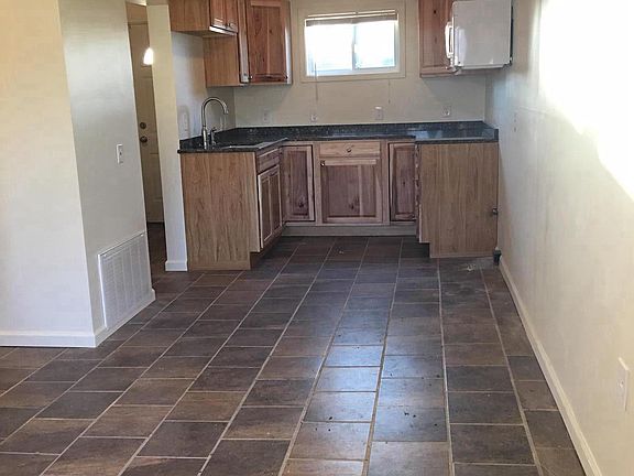 Living Room open to kitchen area, room for table and chairs