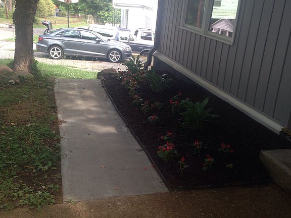 New sidewalk and landscaping