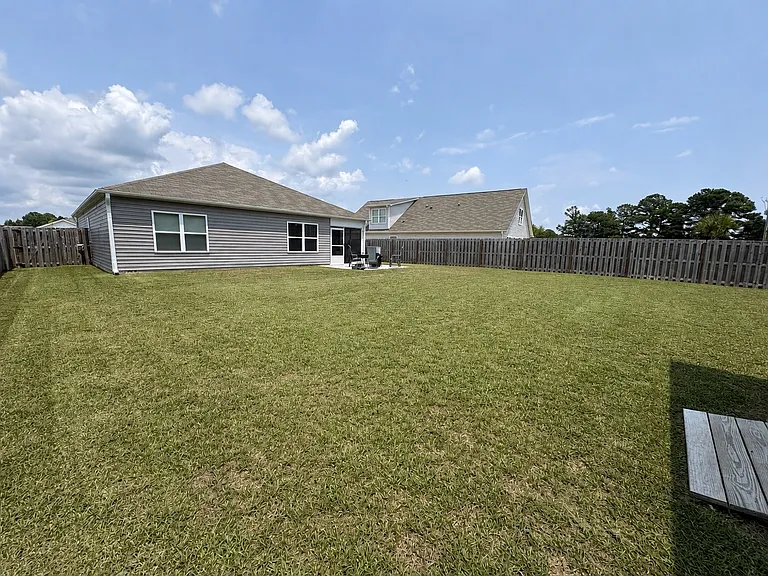 Large fenced in backyard