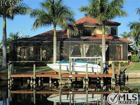 Morning sun highlights the dock, lanai and pool each day.