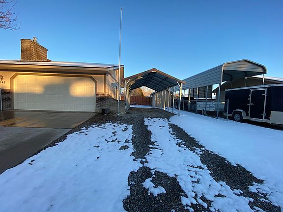 Front of property showing truck port.
