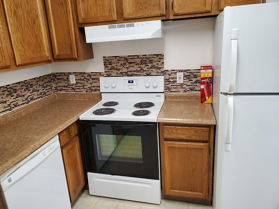 Working dishwasher, oven, stove, refrigerator, and fire extinguishers in each unit.
