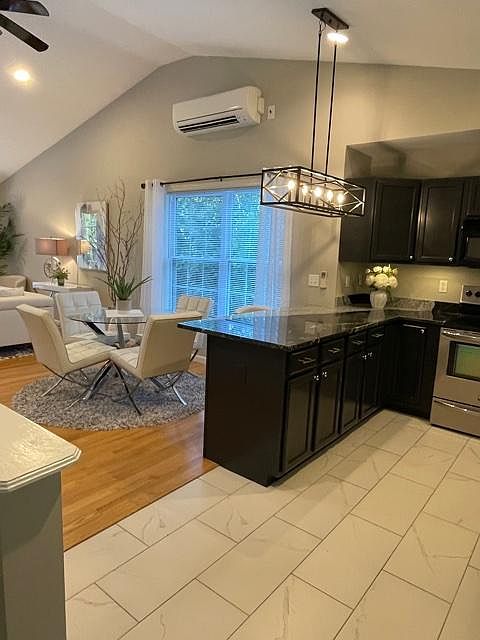 kitchen with granite counters and stainless appliances