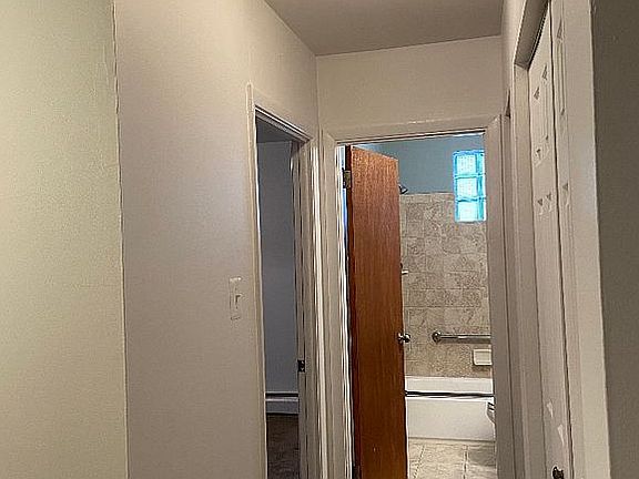 Hallway to bath and bedroom 