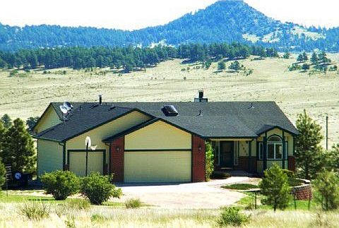 Beautifully Maintained Custom Built Home