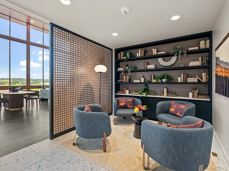 Expand your horizons: Discover tranquility and knowledge in our sky lounge library, where every page turns into an escape above the city hustle. ____