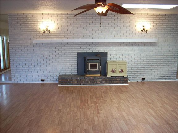 Main floor living room with pellet stove