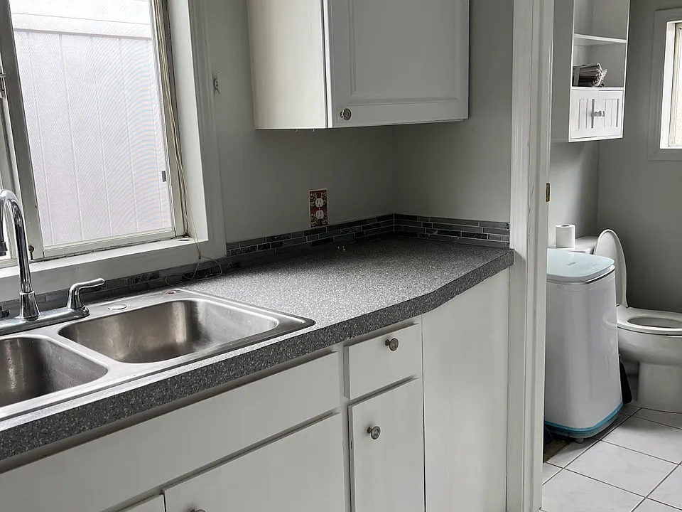 Kitchen into bathroom