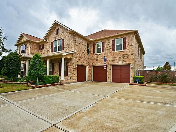 3 car garage and extra wide driveway for parking...or playing.
