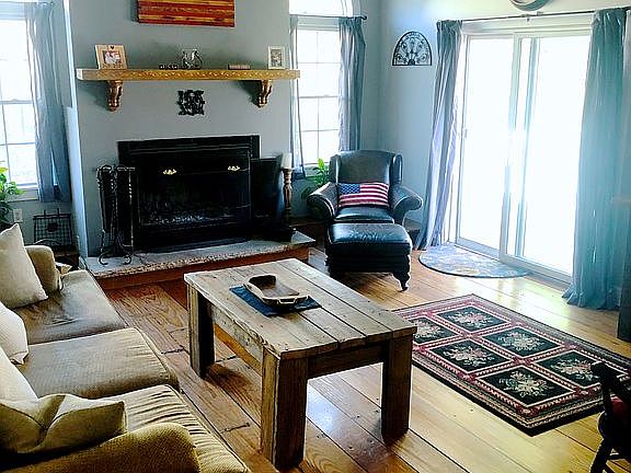 Family room with wood floor