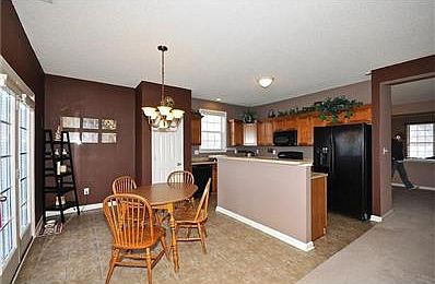 Double doors not sliders out to the pond view yard. Breakfast room off the kitchen.