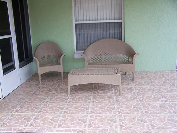 screened in FL room and outside patio area