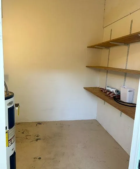 Washer and Dryer hookup and storage area