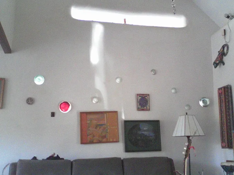 The morning and evening sun makes patterns on the walls.