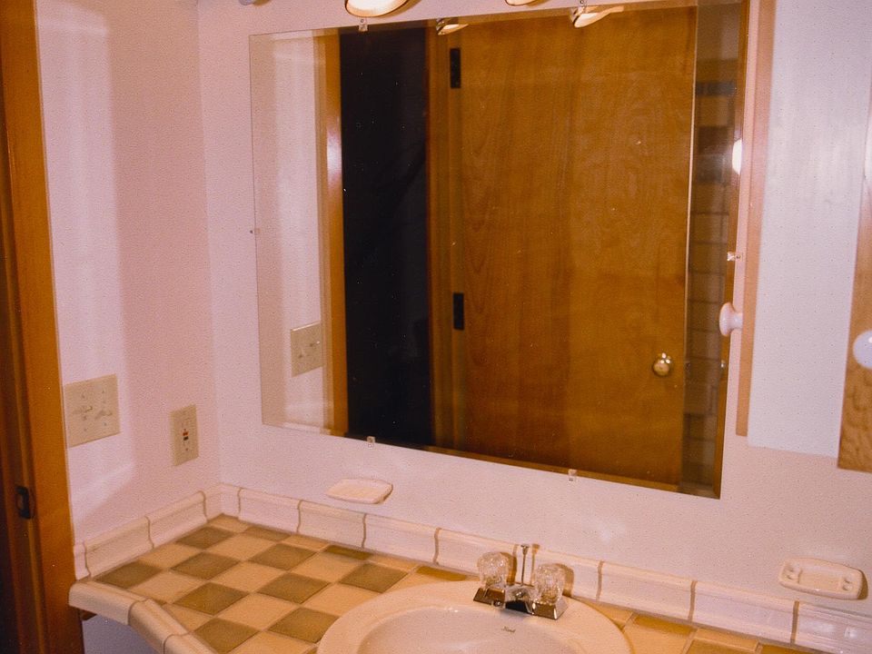Main bath - art tile vanity, tile by Pratt and Larson