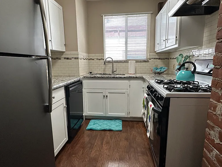 Stainless steel and black appliances.