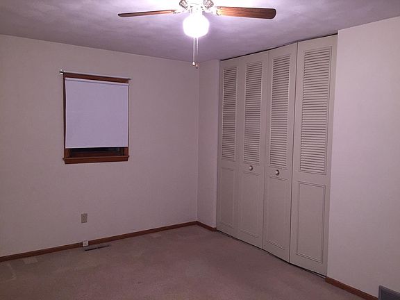 Mainfloor bedroom 1, ceiling fan New paint wall, large closet