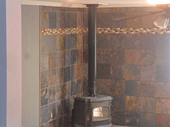 Gas fireplace with slate.